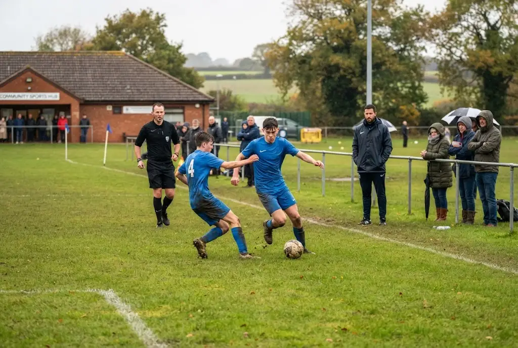 Football county leagues youth match at a UK grassroots community football ground